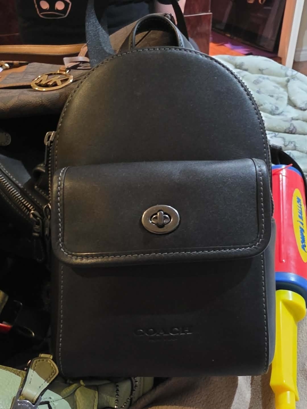 Coach Black Leather Mini Backpack with Front Turn-Lock Pocket